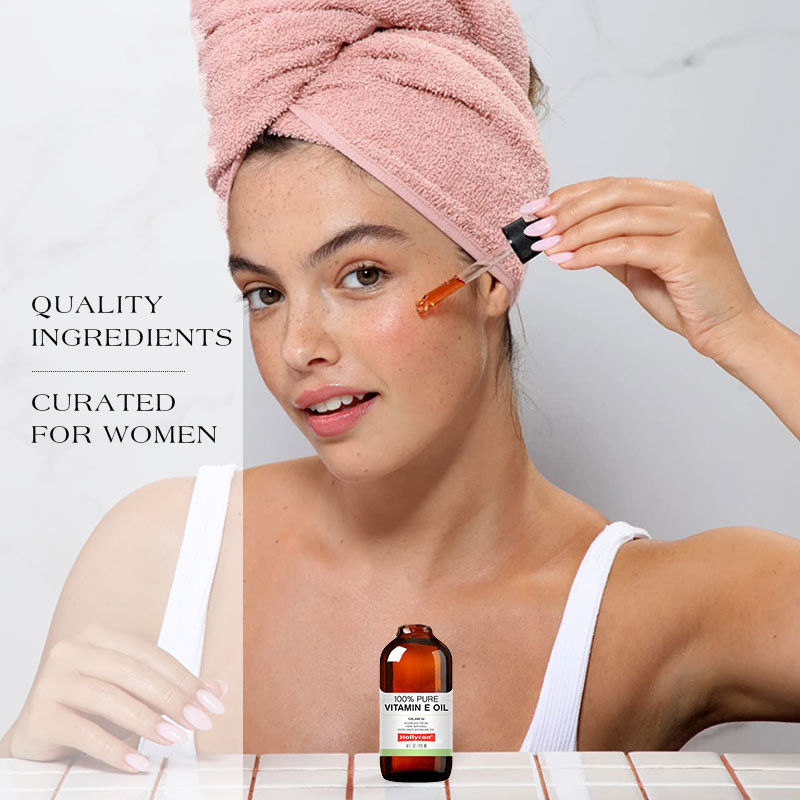 OEM Gocce di olio di vitamina E pura al 100% per ringiovanimento della pelle e prevenzione delle cicatrici